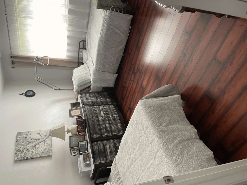 A bedroom with two beds